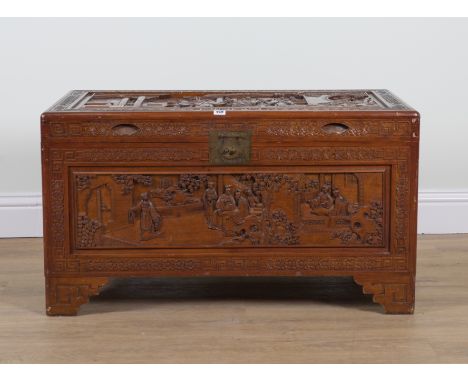 A CHINESE EXPORT CARVED CAMPHOR WOOD TRUNK100cm wide; 52cm deep; 64cm high