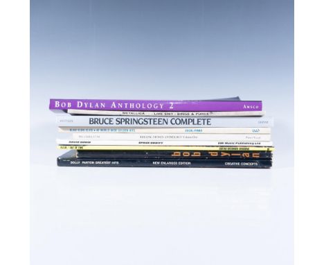 A set of 9 books, including 8 sheet music books with the Bob Dylan Song Book, Bruce Springsteen Complete, Elvis Elvis Elvis 4