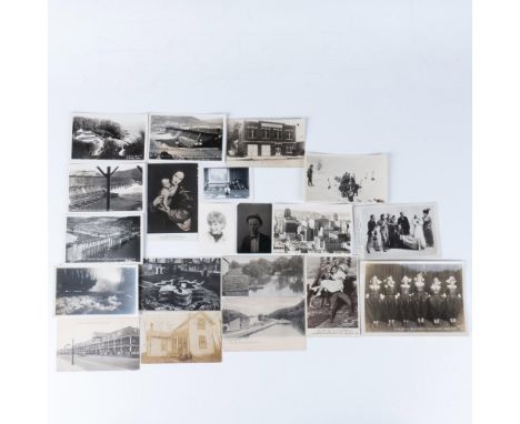 A striking collection of black and white items features vintage photographs of people in classic clothing, a postcard of Mado