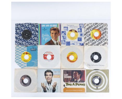 This lot includes singles from artists such as The Beatles, Patsy Cline, Bobby Rydell, The Rolling Stones, Billy Preston (on 