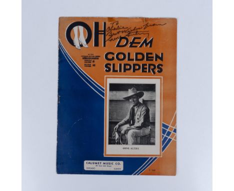 The sheet music for Oh Dem Golden Slippers is signed and dedicated by Gene Autry. Issued: 1930'sDimensions: 9.25"L x 12.25"HC