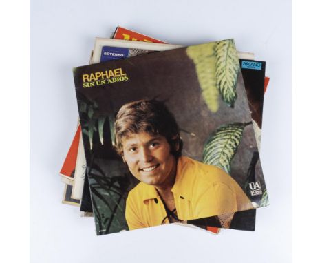 Collection of jacketed Latin artist albums including Raphael Sin Un Adios, Marco Antonio Muniz, Luis Carbonell, Hector Cabrer