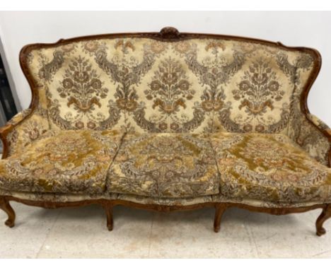 Carved Mahogany framed 19th century 3 seater sofa, with upholstered &amp; metal studded floral patterned fabric