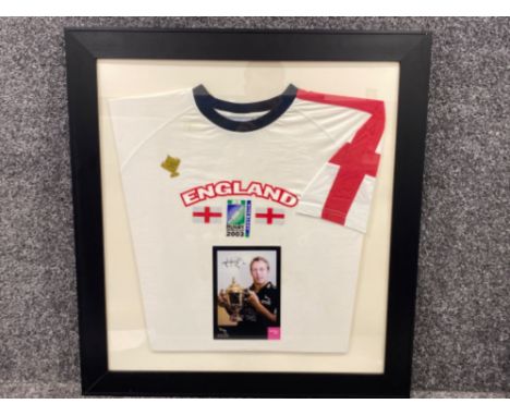 Framed England Rugby World Cup 2003 shirt with signed Jonny Wilkinson “Newcastle Falcons” picture, 72x79cm