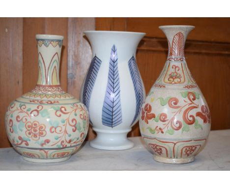 A trio of vases to include a near pair of Safi style vases together with a Burleigh Ware leaf vase (3), tallest 24cm.  In goo