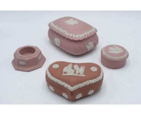 Wedgwood Jasperware in pink to include two trinkets and a candle holder together with pale terracotta heart-shaped trinket (4