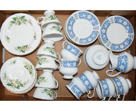 A collection of Royal Albert Tudor Rose tea ware to include 6 cups, 6 saucers, 6 side plates and a milk and sugar bowl togeth