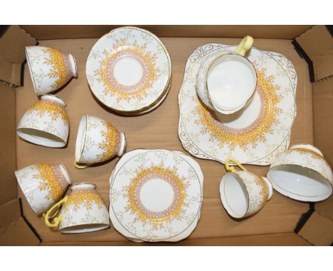 Royal Grafton tea ware in the 'Frinton' pattern to include 6 cups, 6 saucers, 6 side plates, a milk jug, sugar bowl and cake 