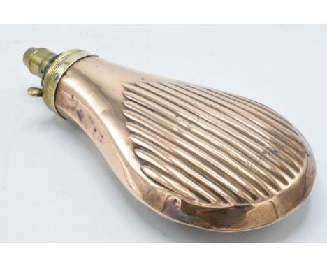 19th century copper and brass powder flask with ribbed decoration, 17cm long.  