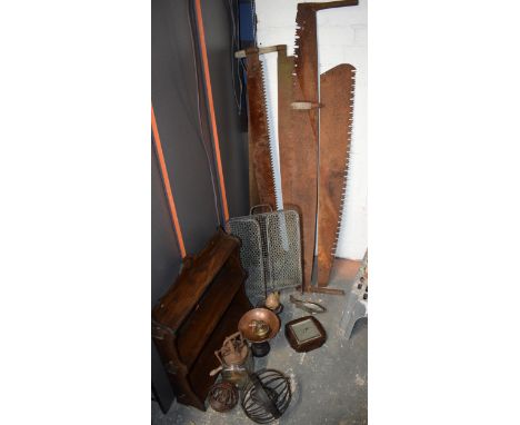 Mixed items to include double handed wood cutting saws, a glass butter churn, wooden shelves, a set of scales and other items
