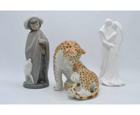 A USSR model of a cheetah, Wedgwood 'To Have &amp; To Hold' figure together with a Nao figure (3).  In good condition with no