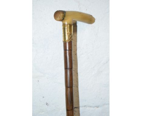 Early 20th century walking stick with gold plated plaque that reads 'W Wright From The Long Eaton Bowling Club 1905, 91cm lon