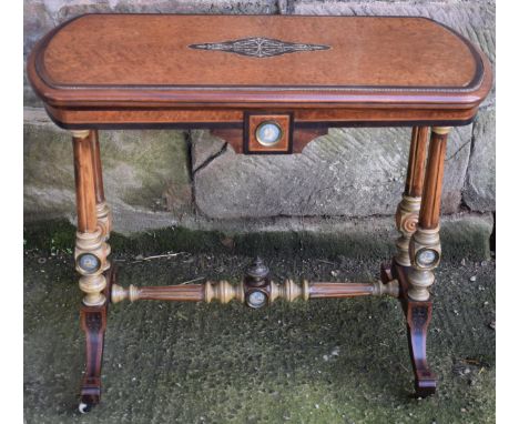 Mid 19th century quarter veneered card table with gilt beading and inlaid central decoration, on turned fluted supports with 