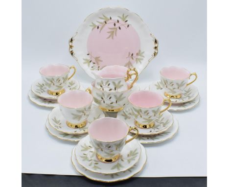 Royal Albert tea ware in the Braemar design to include 6 cups, 6 saucers, 6 side plates, a milk jug, a sugar bowl and a cake 