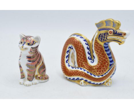 Royal Crown Derby paperweights to include a Dragon and a Cat, both first quality with gold stoppers (2).  In good condition.