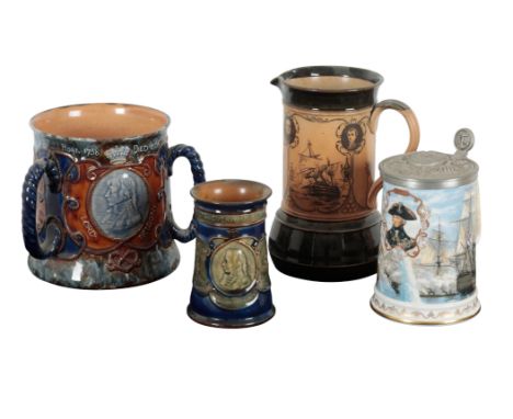 NELSON INTEREST: A COLLECTION OF COMMERATIVE CERAMICS including a Royal Doulton tyg, 17cm high, a Royal Doulton mug, 13cm hig