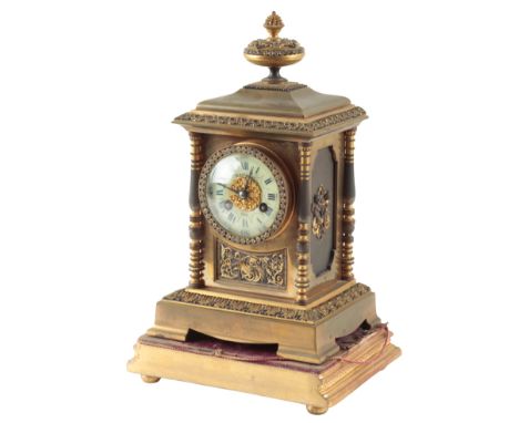 A 19TH CENTURY FRENCH BRASS MANTLE CLOCK BY VINCENZI ET CIE retailed by W Magrett, Paris, the cream dial with Roman and Arabi