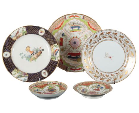 THREE WORCESTER PORCELAIN PLATES in the dragon in panel pattern, the larger 25cm wide, the smaller each 14cm wide, together w