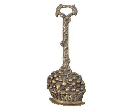 A BRASS DOOR STOP in the form of a flower basket, with foliate draped handle, 36cm high