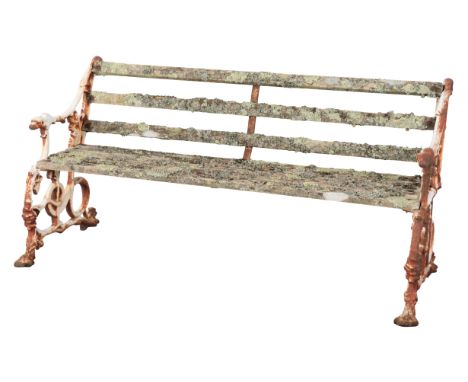 A COALBROOKDALE STYLE CAST IRON AND WHITE PAINTED GARDEN BENCH serpent and grape pattern, each end with figured dog head fini