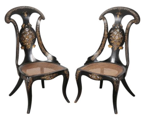 A PAIR OF VICTORIAN PAPIER MACHE CHAIRS the shaped back inlaid with mother of pearl floral sprays with gilt banding, over can