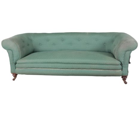 A MAHOGANY CHESTERFIELD SETTEE 19th century, stamped 'BL309' to the back left leg, with button back cotton covers, on turned 