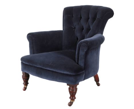 A VICTORIAN EASY ARMCHAIR with blue velvet button back covers, on turned front legs and castors, 83cm high x 76cm wide x 75cm