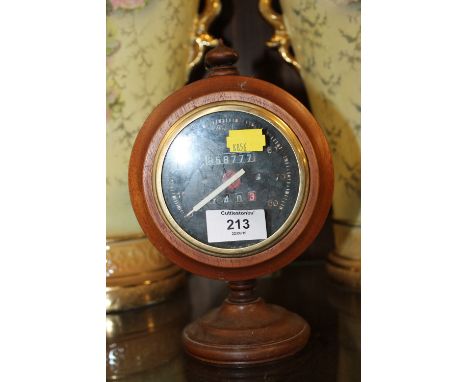 A VINTAGE WOODEN SPEEDOMETER