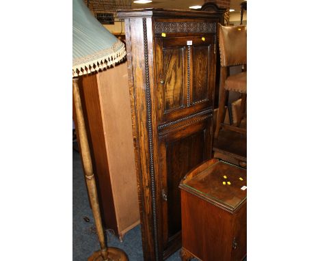 AN OAK CORNER CUPBOARD & STANDARD LAMP