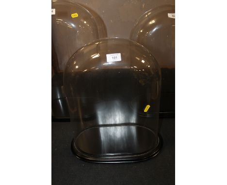 A LARGE GLASS CLOCK DOME AND STAND