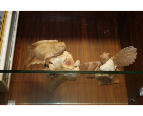 A LIGHT WOOD CARVED OWL FIGURE & A LIGHT WOOD CARVED FISH (2)
