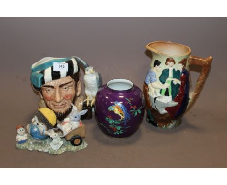 FOUR CERAMIC ITEMS CONSISTING OF A PURPLE CARLTON WARE GINGER JAR A/F, ROYAL DOULTON 'THE FALCONER' CHARACTER JUG, BURLEIGH W