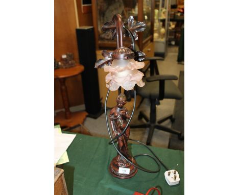 A FIGURATIVE METAL LAMP WITH FLORAL PINK GLASS SHADE