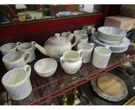 A Burleigh Asiatic Pheasants blue and white transfer ware teapot, nine mugs, sugar bowl, jug, five bowls and six soup bowls