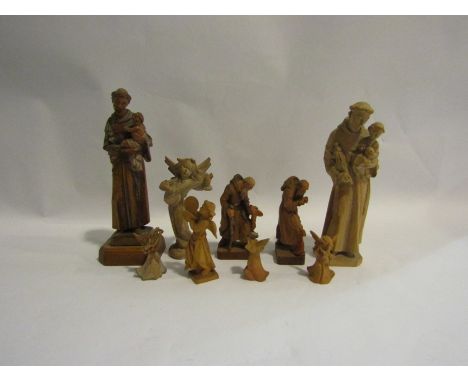 A collection of Italian carved wooden figures, saints, angels etc (9)