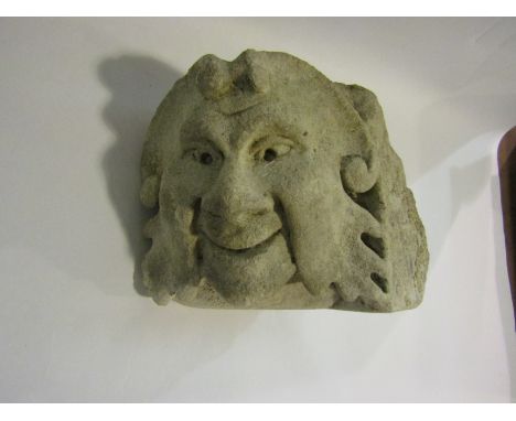 A Victorian carved stone door bracket depicting the green man 