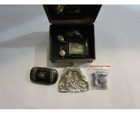 A trinket box with tortoiseshell vesta case, miniature white metal and enamel picture frame, earrings ceramic beads, purse et