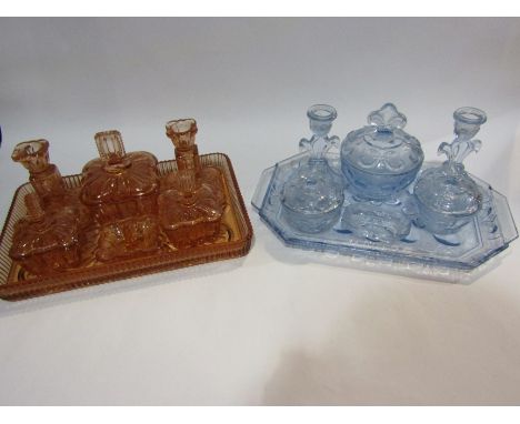 Two moulded coloured glass dressing table sets