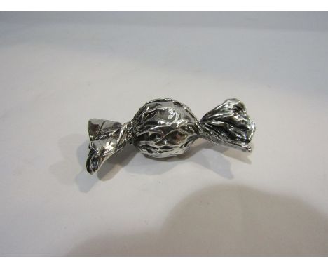 A silver sweetie model, unmarked, filled 