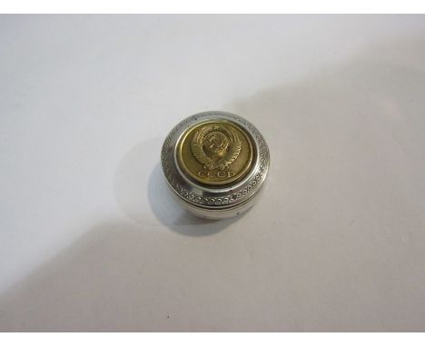 A white metal pill/snuff box with CCCP Communist Russian emblem to lid, stamped 900