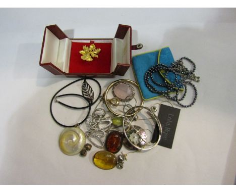 A quantity of bijouterie including amber brooch, black pearl necklace, bangle stamped 925 etc