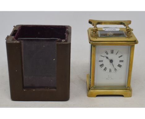 A carriage clock, in a brass case, an outer carrying case, assorted ceramics and other items (box) 