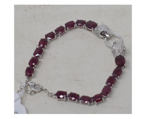 A silver and ruby set panther braceletReport by RBModern 