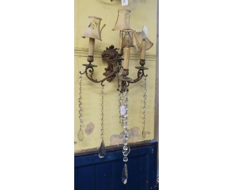 A pair of gilt metal four light wall sconces, with crystal drops, 36 cm wide (2) 