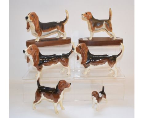 A Beswick Connoisseur dog, Beagle Wendover Billy, 1933B, another Connoisseur dog, Basset Hound Fochno Trinket, 2045B, and fou