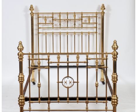 A Victorian brass bedstead, 140 cm wide See illustrationReport GHSome of the finials are a bit bent and the left hand finial 