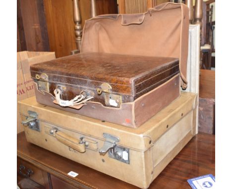 A faux crocodile leather travelling case, with canvas cover, 52 cm wide, a vellum suitcase, golf clubs, light fittings, pewte