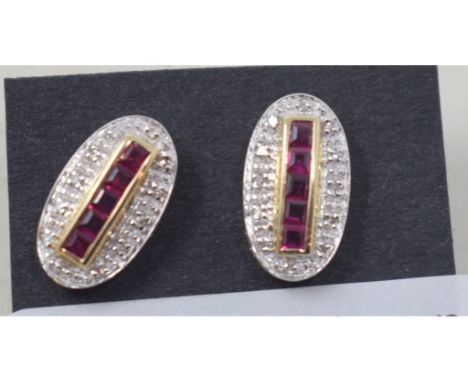 A pair of Art Deco style 9ct gold calibre cut ruby and diamond earringsReport by RBModern 