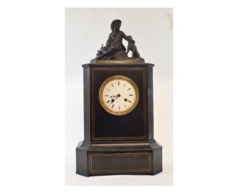 A late 19th/early 20th century mantel clock, the 9.5 cm diameter enamel dial with Roman numerals, fitted an eight day movemen