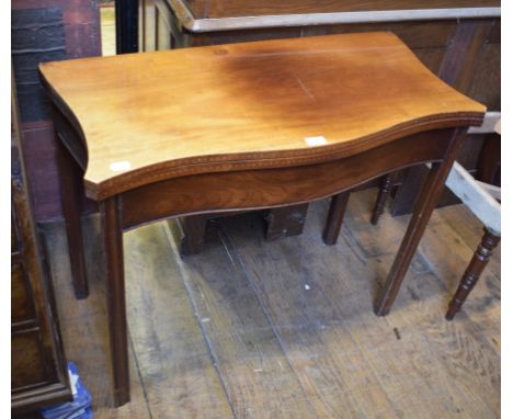 An inlaid mahogany serpentine front card table, on chamfered square legs, 86 cm wide 